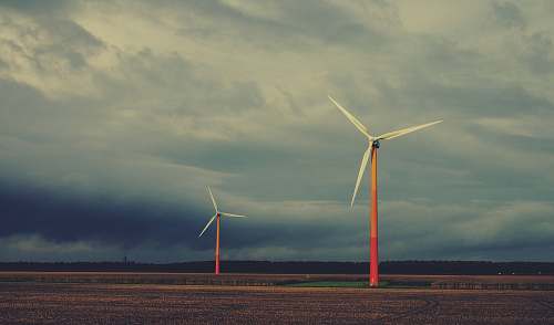 turbine two white-and-orange wind vanes engine